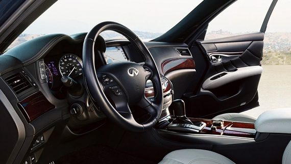 Interior View Of 2019 INFINITI Q70 Sedan's Steering Wheel And Driver Console
