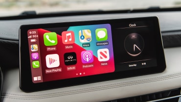 Interior view of INFINITI vehicle highlighting Apple CarPlay feature