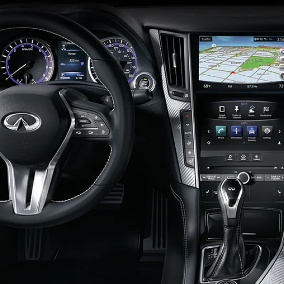 Interior view of INFINITI vehicle showing InTouch navigation