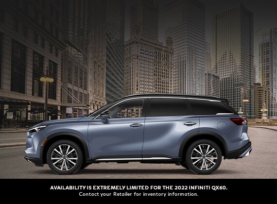Driver-side exterior profile of 2022 INFINITI QX60 shown in Moonbow Blue color