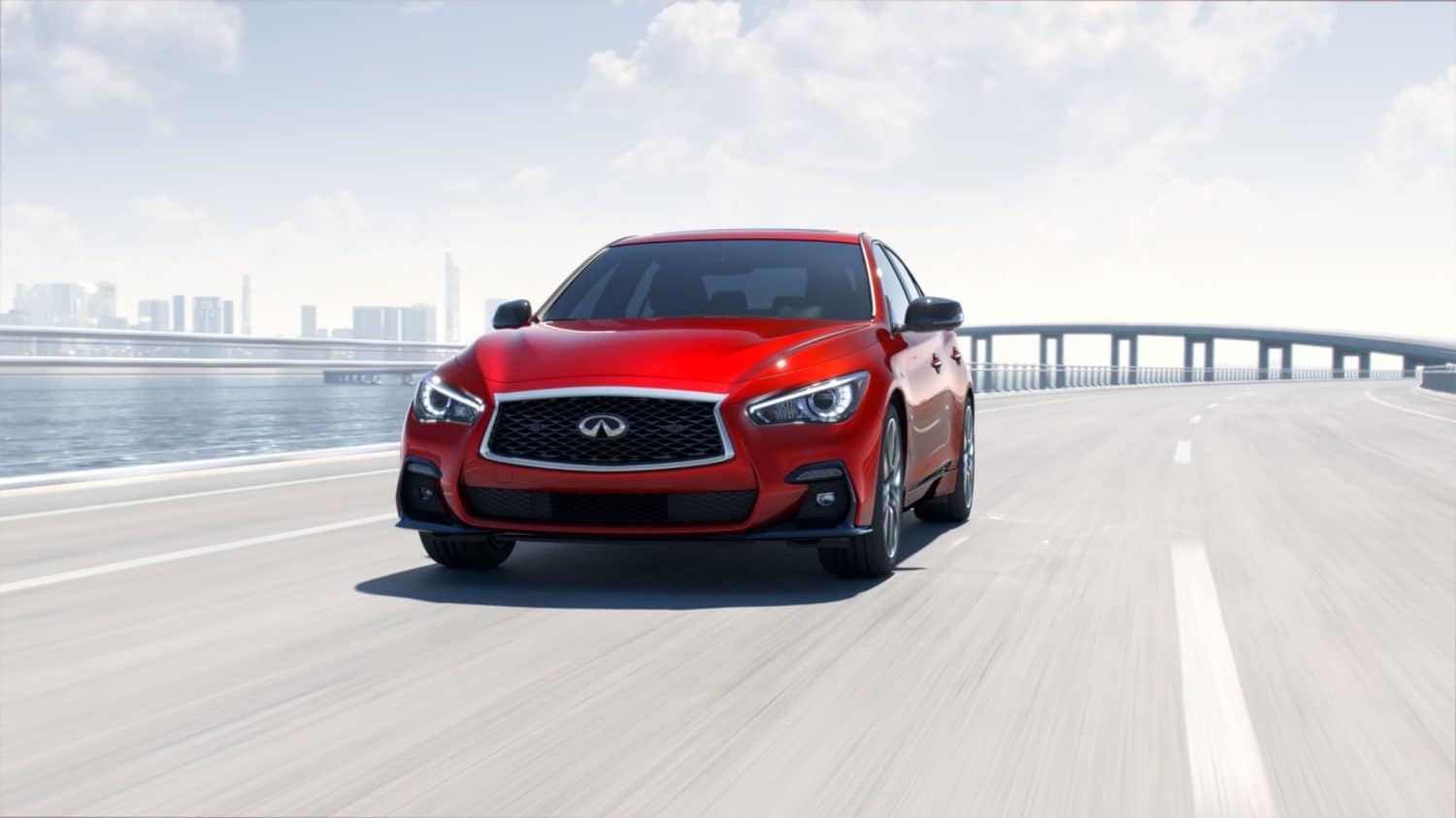 2018 INFINITI Q50 Driving on the Highway Alongside Water
