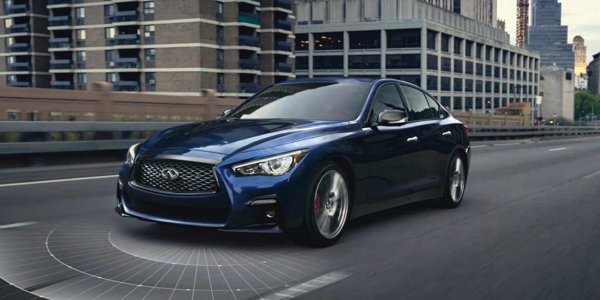 Side profile view of 2023 INFINITI Q50 Luxury Sedan highlighting driver assistance technology
