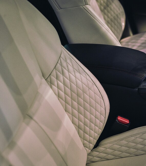 Close up of 2023 INFINITI Q50 front seats highlighting semi-aniline leather seats