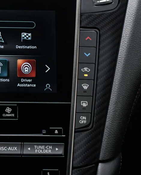Interior close up of the 2023 INFINITI Q50's climate control system