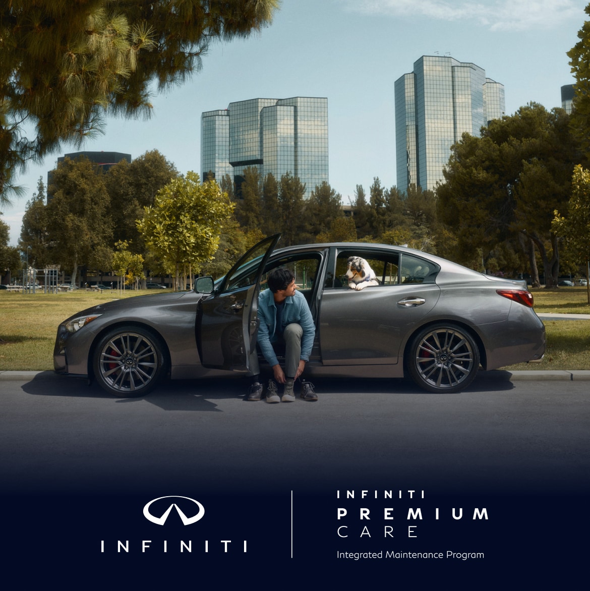 024 INFINITI Q50 Luxury Sedan with man changing his footwear in driver seat while looking at his dog in back seat