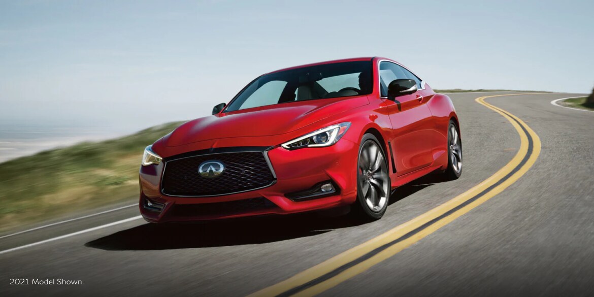 red 2022 INFINITI Q60 RED SPORT 400 driving on road