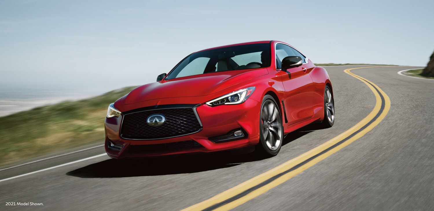 red 2022 INFINITI Q60 RED SPORT 400 driving on road
