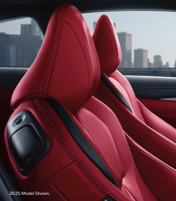 Close up view of 2022 INFINITI Q60 RED SPORT 400 interior highlighting red leather front seats