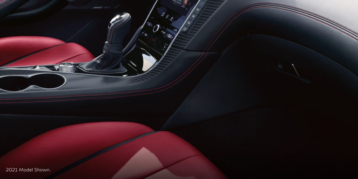 Close up of 2022 INFINITI Q60 Coupe's interior highlighting driver console
