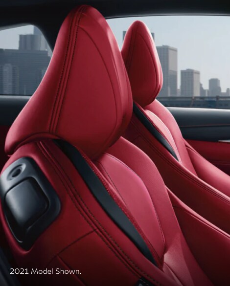 Close up view of 2022 INFINITI Q60 RED SPORT 400 interior highlighting red leather front seats