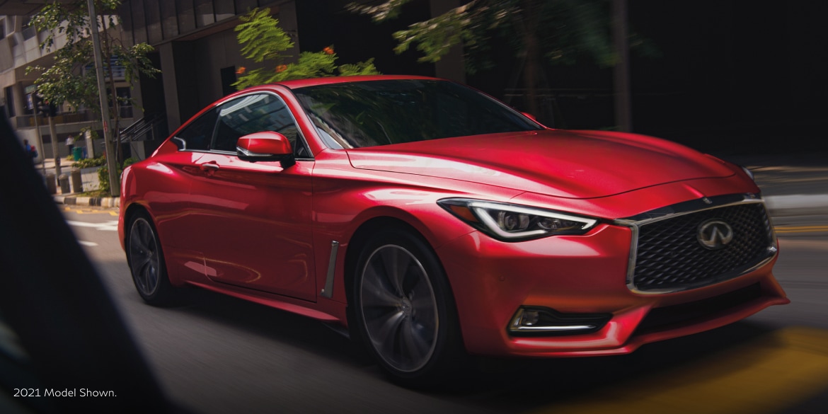 Passenger side profile view of a red 2022 INFINITI Q60 Coupe