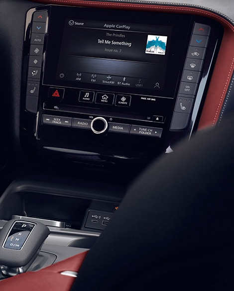 Interior of 2024 INFINITI QX50 featuring INFINITI InTouch features on the infotainment screen