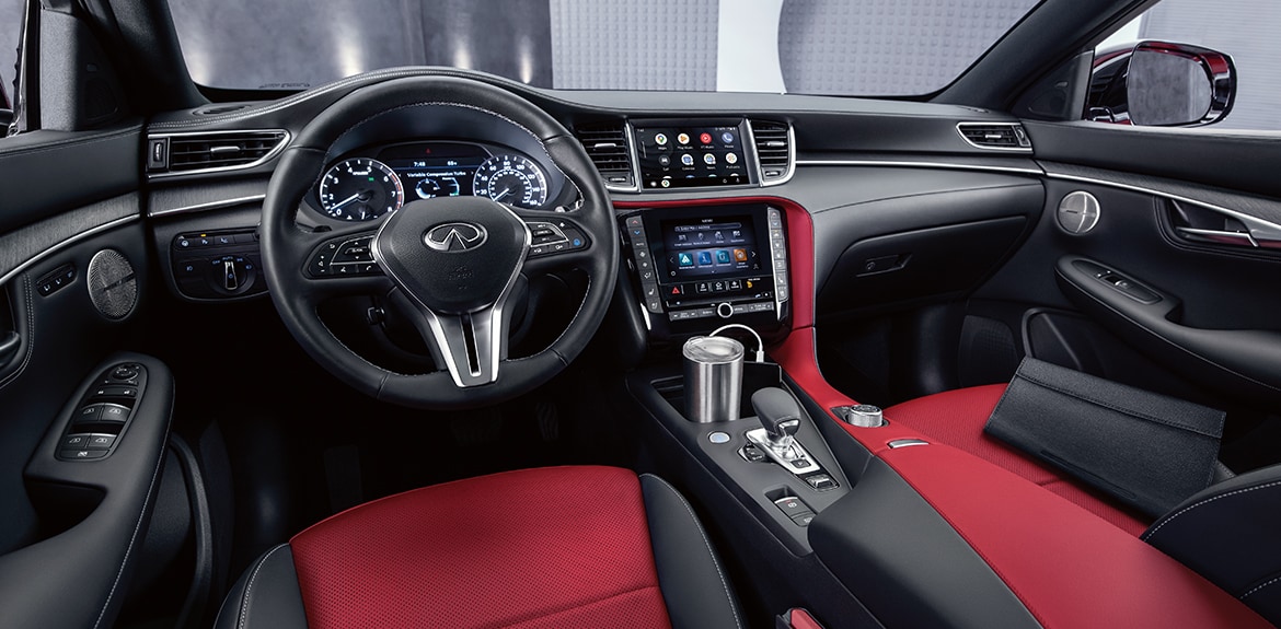 2023 INFINITI QX55 interior highlighting front seats and driver console