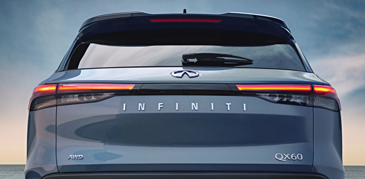 Rear exterior view of 2022 INFINITI QX60 Crossover SUV highlighting LED taillights