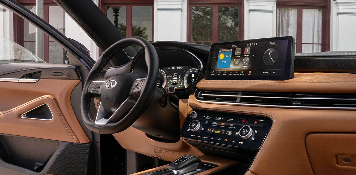 Interior view of 2023 INFINITI QX60 12.3 inch touch display highlighting navigation feature