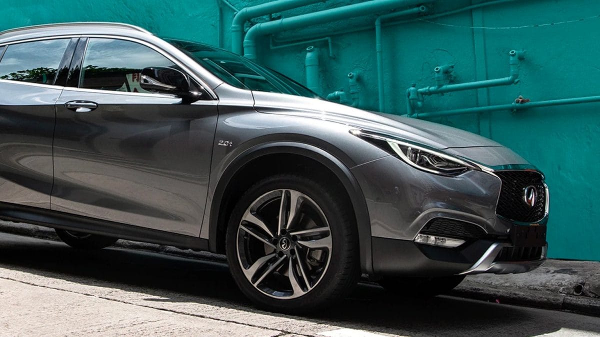 Passenger-Side View Of 2019 INFINITI QX30 Exterior Highlighting Available Intelligent Park Assist Technology