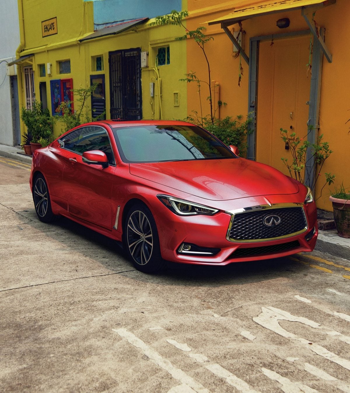 Red INFINITI Q60 Coupe parked on street