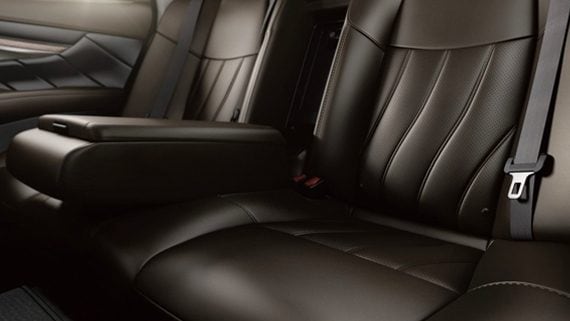 Interior View Of Luxurious Leather Interior In The 2019 INFINITI Q70L Large Sedan Highlighting Rear Seats
