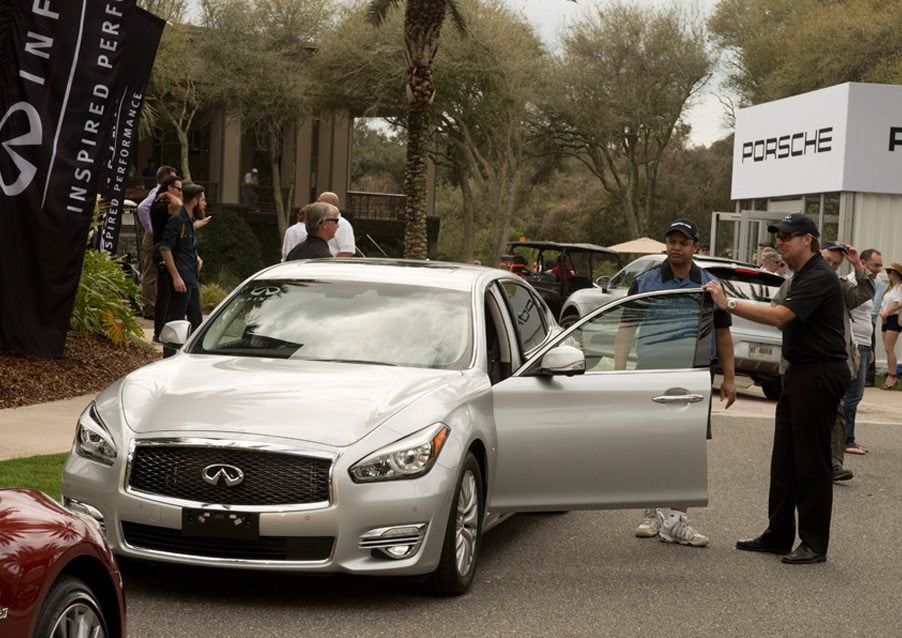 Participants checking out the Q70L luxury sedan at the 2015 Amelia Island Concours d'Elegance
